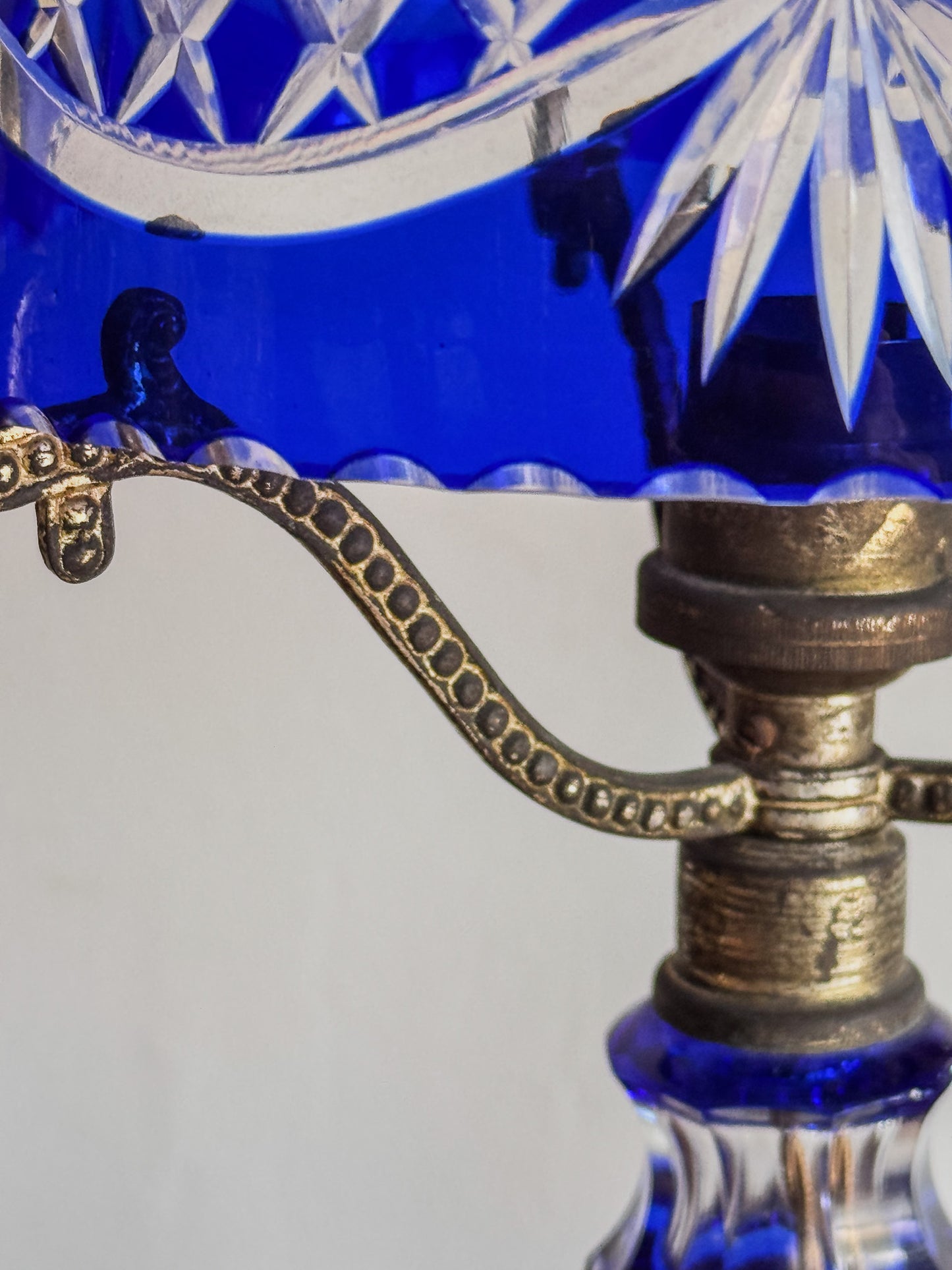 A Pair of Edwardian Bohemian Blue Cut Glass Lamps